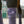 Lila Equestrian Fleecebandagen mit glitzerndem Satin-Klettverschluss und Pferdekopf-Logo, perfekt für stilvollen Beinschutz beim Turnier.