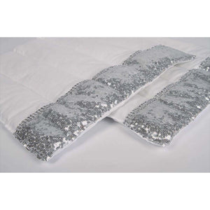 Detailansicht der Harrys Horse Bandagierunterlagen - Champion 2er Set mit silbernen Pailletten, luxuriöses Design für Turniere, 42x38 cm.