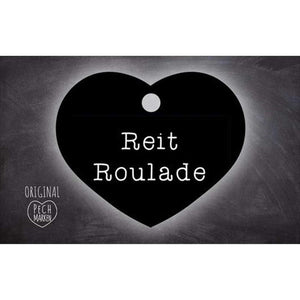Herzförmige Pechmarke Reitroulade mit weißer Schrift und Schlüsselringloch. Reitroulade Pechmarke kaufen – Schlüsselring inklusive.